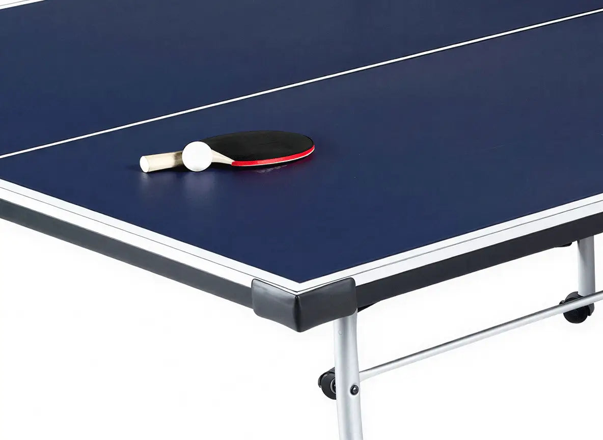 Close-up of the blue 15mm ping pong table playfield, edge trim and corner protector