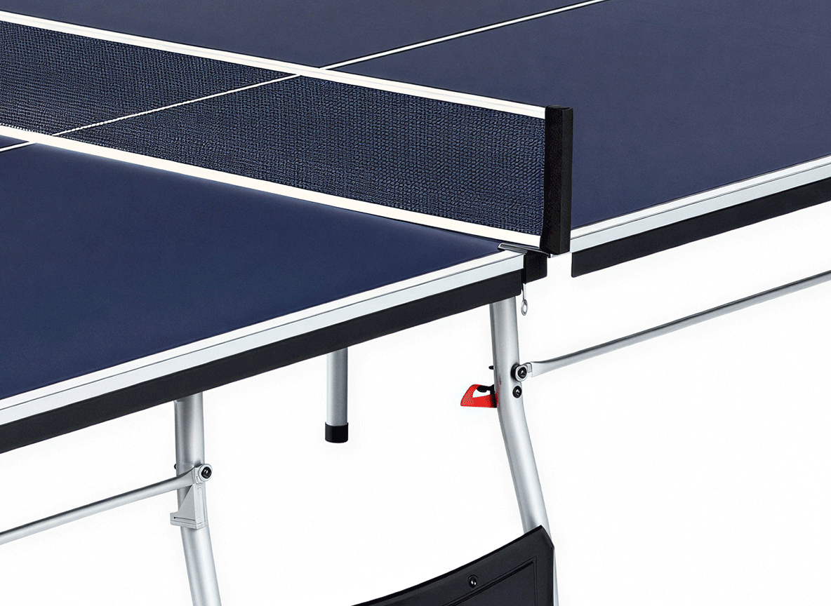 Close-up of a table tennis table with net and blue surface