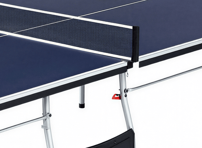 Close-up of a table tennis table with net and blue surface