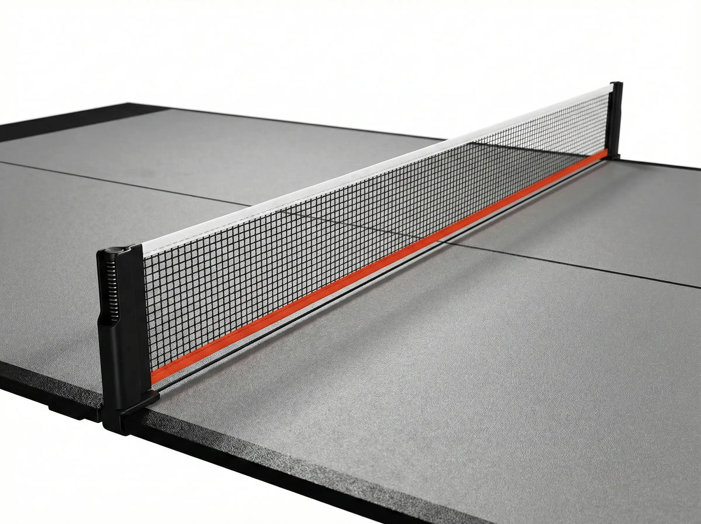 Close-up of the clamp-on net attached to the edge of a gray ping pong conversion top