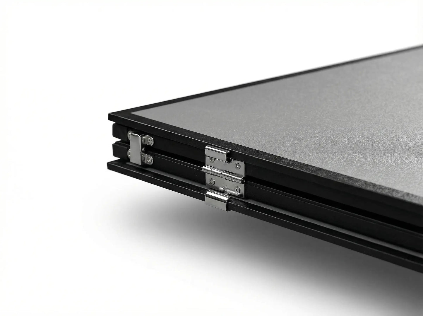 Close-up of the metal hinges on a folded ping pong conversion-top half