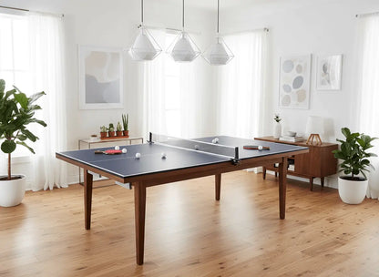 Blue ping pong conversion top with clamp-on net in a bright modern home game room