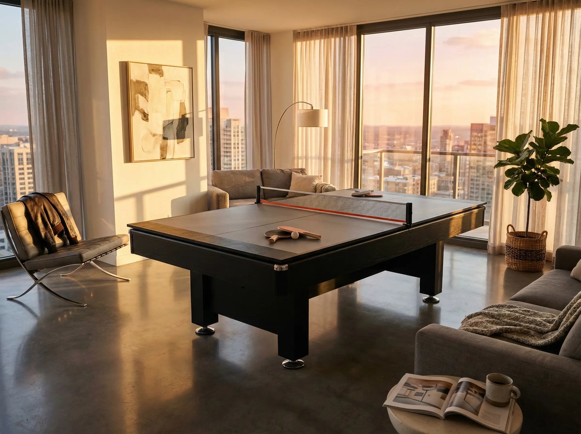 Gray ping pong top installed on a pool table in a modern apartment at sunset